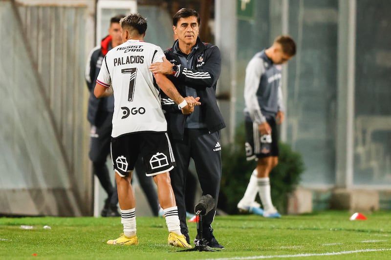 Carlos Palacios y Gustavo Quinteros. / Photosport