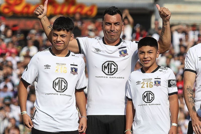 Esetban Paredes junto a sus hijos, Esteban y Vicente